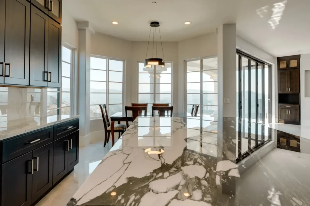Black marble countertop in modern kitchen.