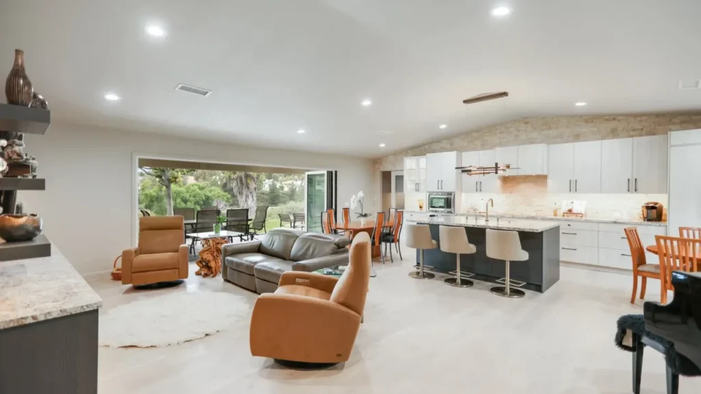 Open concept living space with kitchen, dining, and living areas.