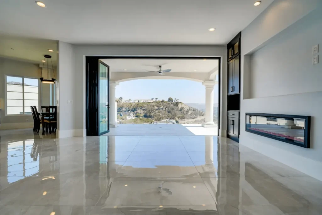 Modern house interior with large glass doors.