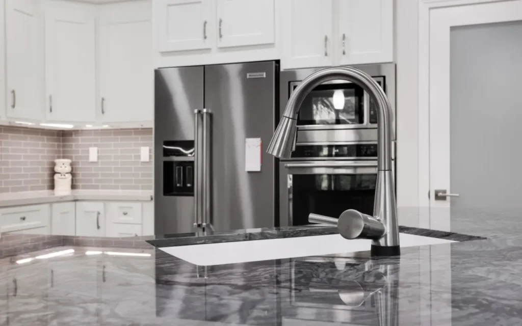 A modern kitchen sink and faucet.