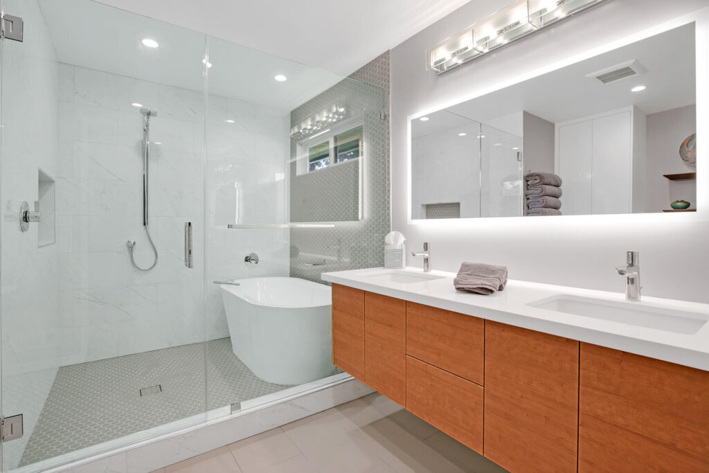 Modern bathroom with large soaking tub and double vanity.